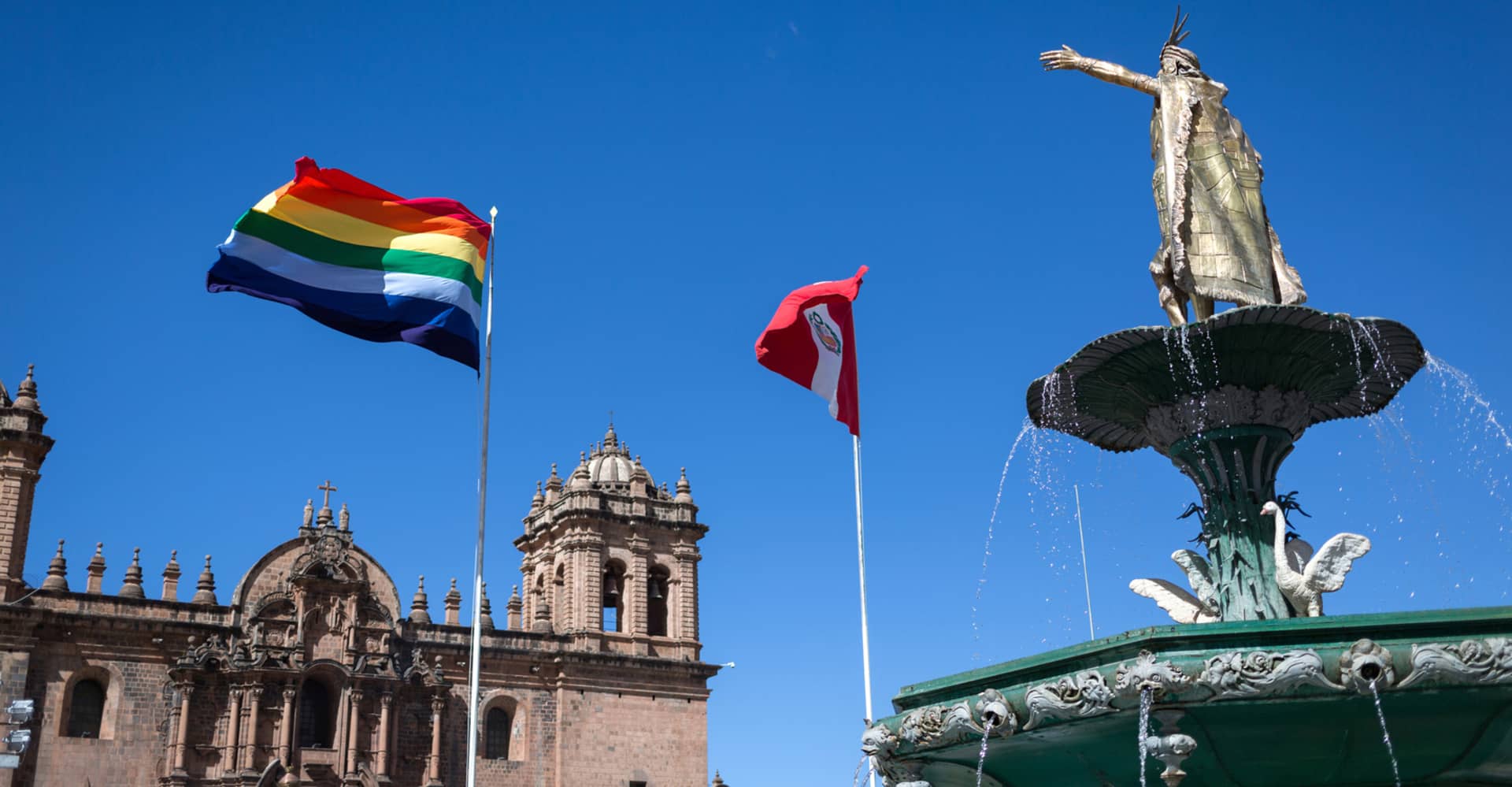 Flag of Cusco next to the flag of Peru