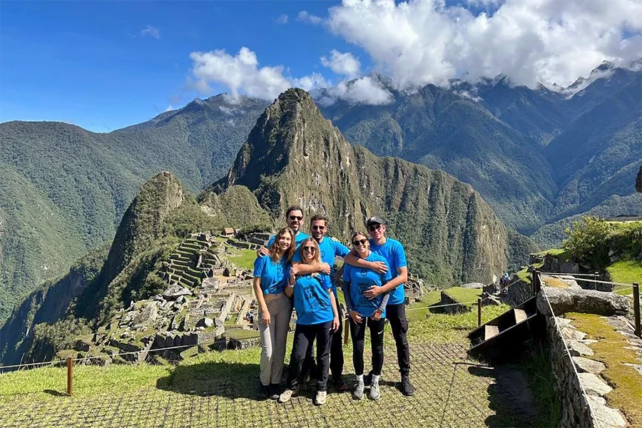 Tourist at Machu Picchu Group of tourists at Machu Picchu with mountain in the background.