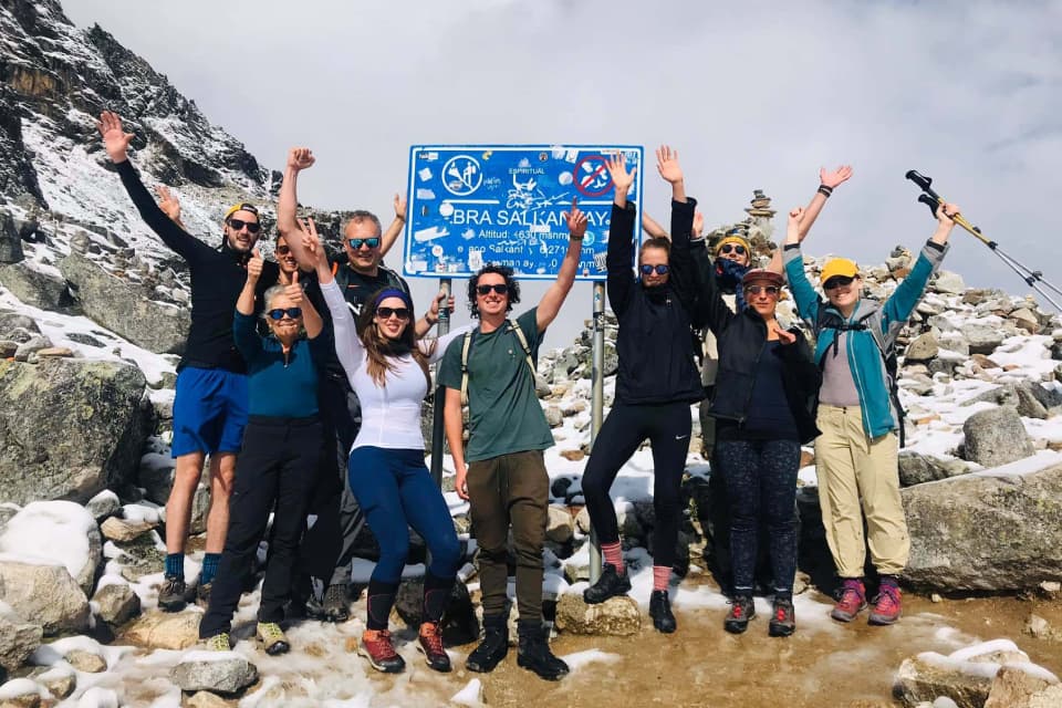 Hikers at the top of Salkantay Pass during the Salkantay Trek 4 days tour