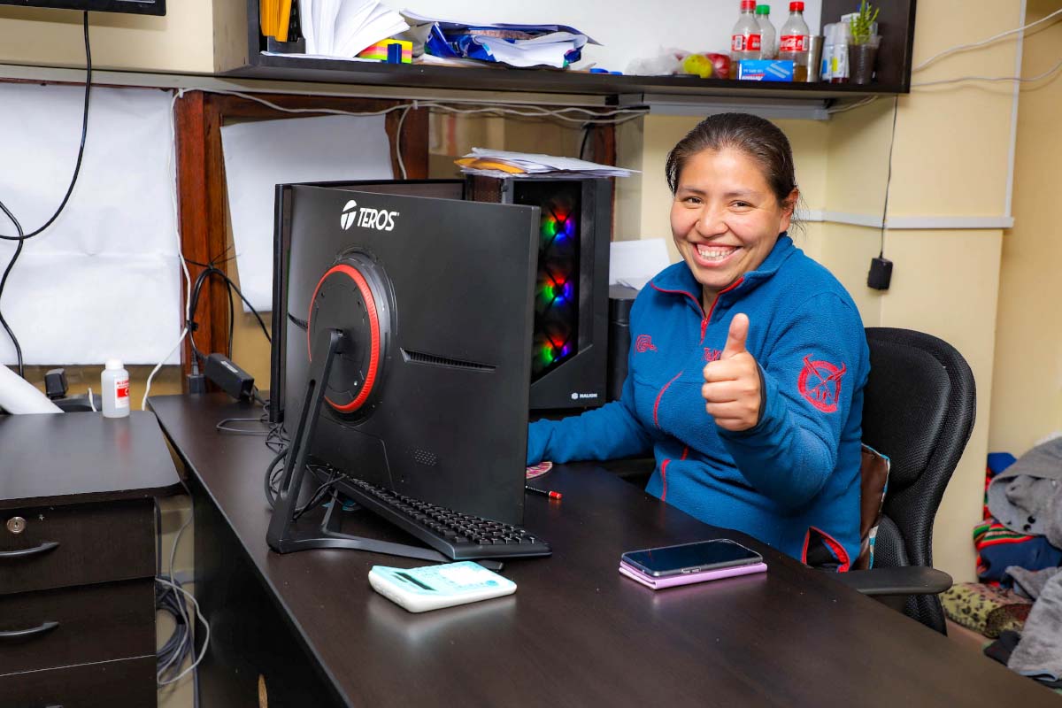 TreXperience female staff member working in an office in Cusco | TreXperience