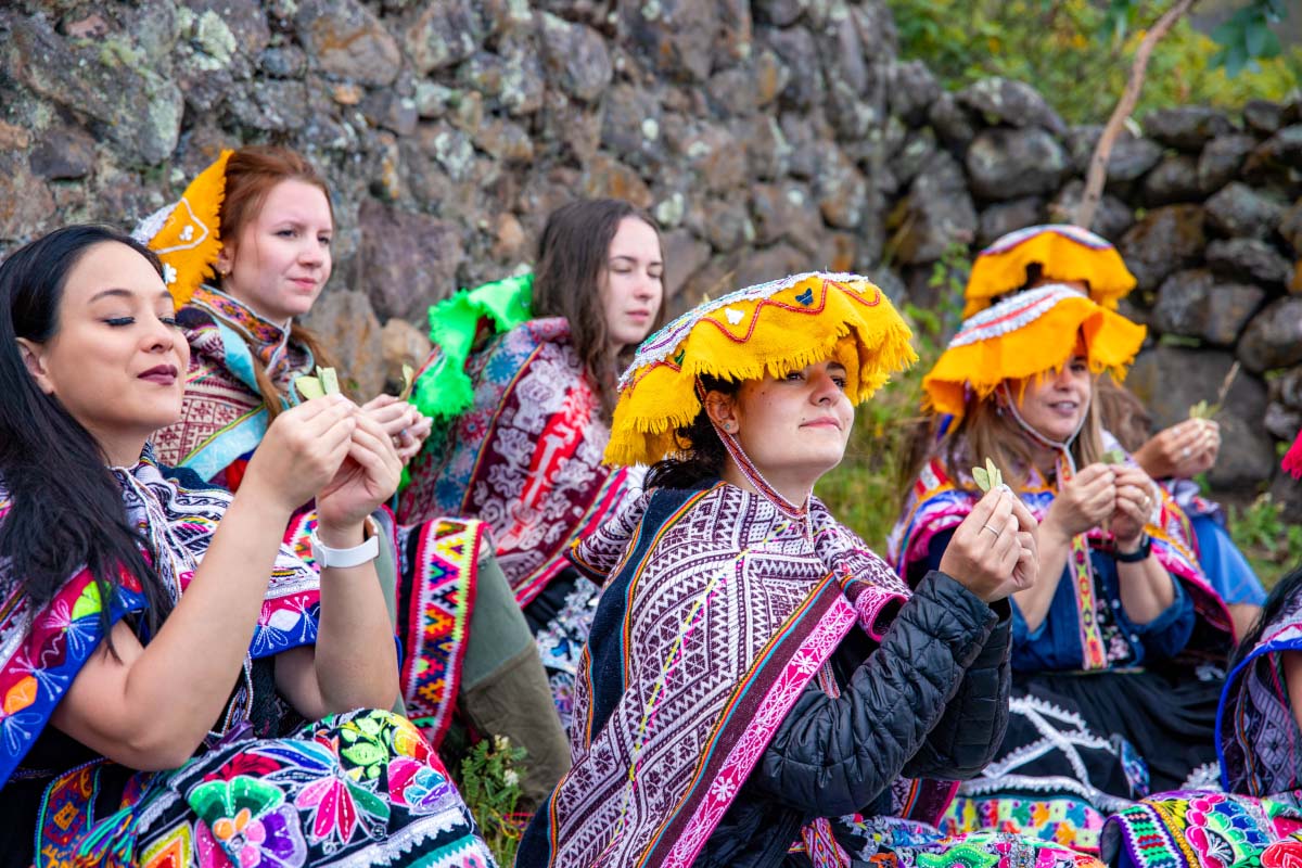Female tourists dressed in the traditional clothing of Andean women | TreXperience