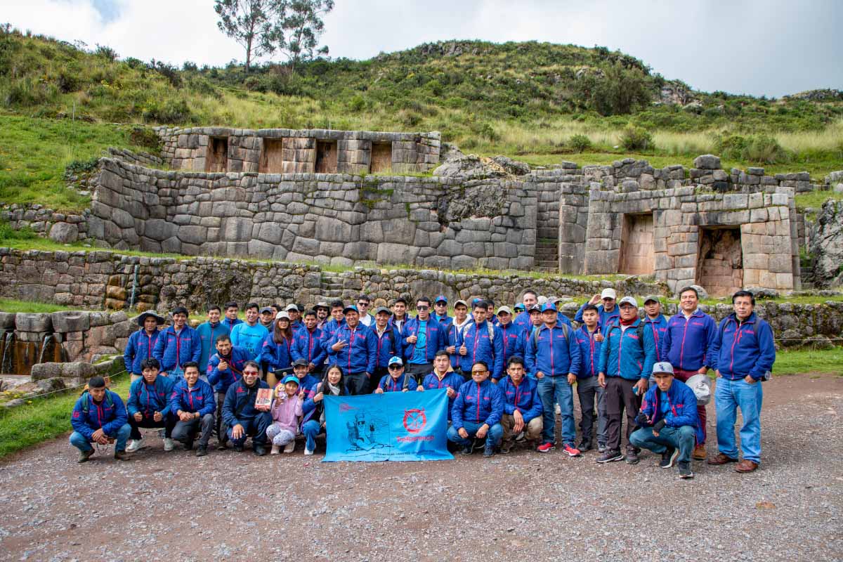 TreXperience staff with a Trex banderole in Tambomachay Inca site TreXperience staff with a Trex banderole in Tambomachay Inca site