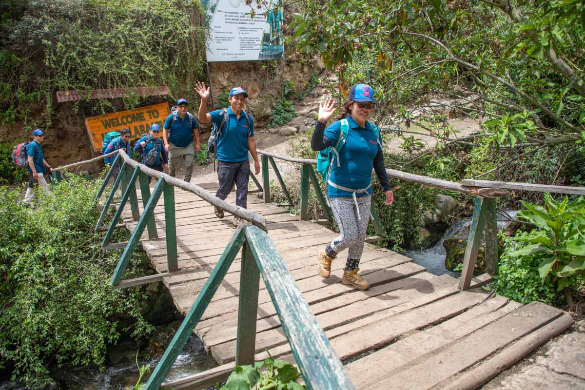 Trexperience staff crossing bridge during the Inca Trail cleanup campaign Trexperience staff crossing bridge during the Inca Trail cleanup campaign