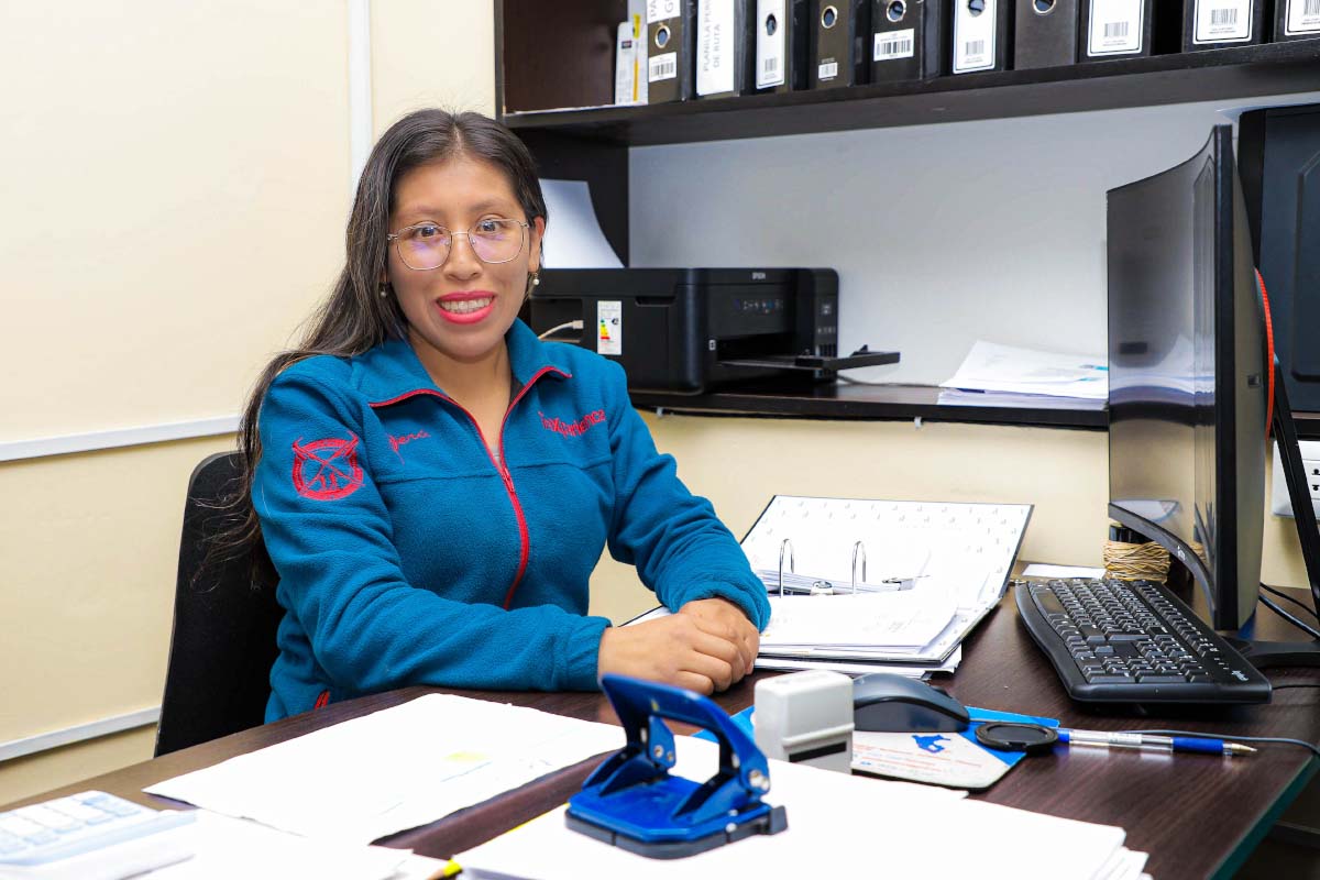 TreXperience female staff member working in an office in Cusco | TreXperience
