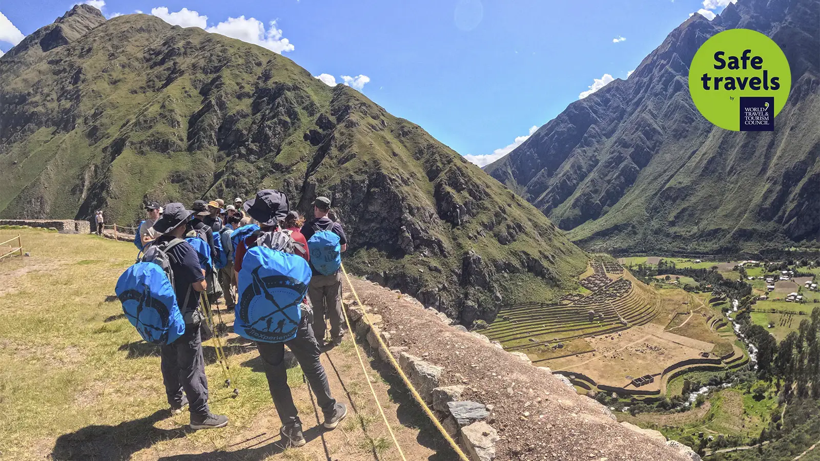 Trexperience group in Patallacta with the safe travels seal