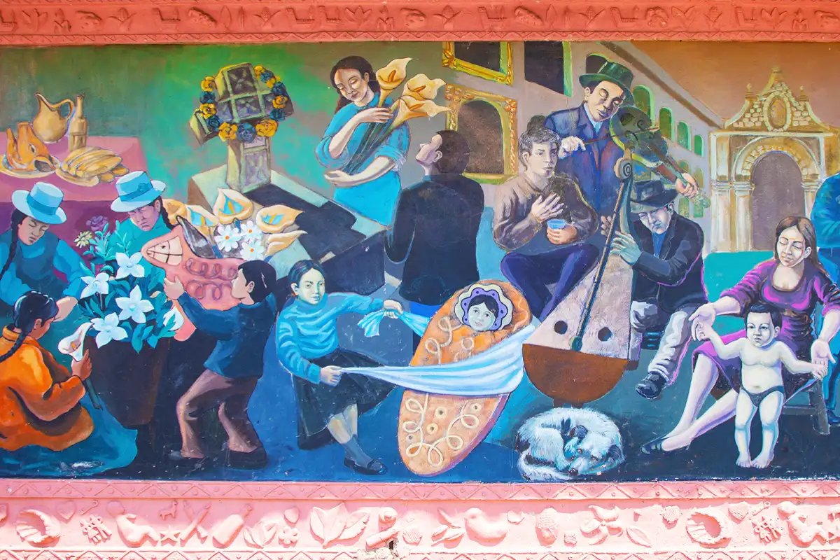 Photo of Mural at Jardín de la Almudena Cemetery showing Cusco Day of the Dead scenes.