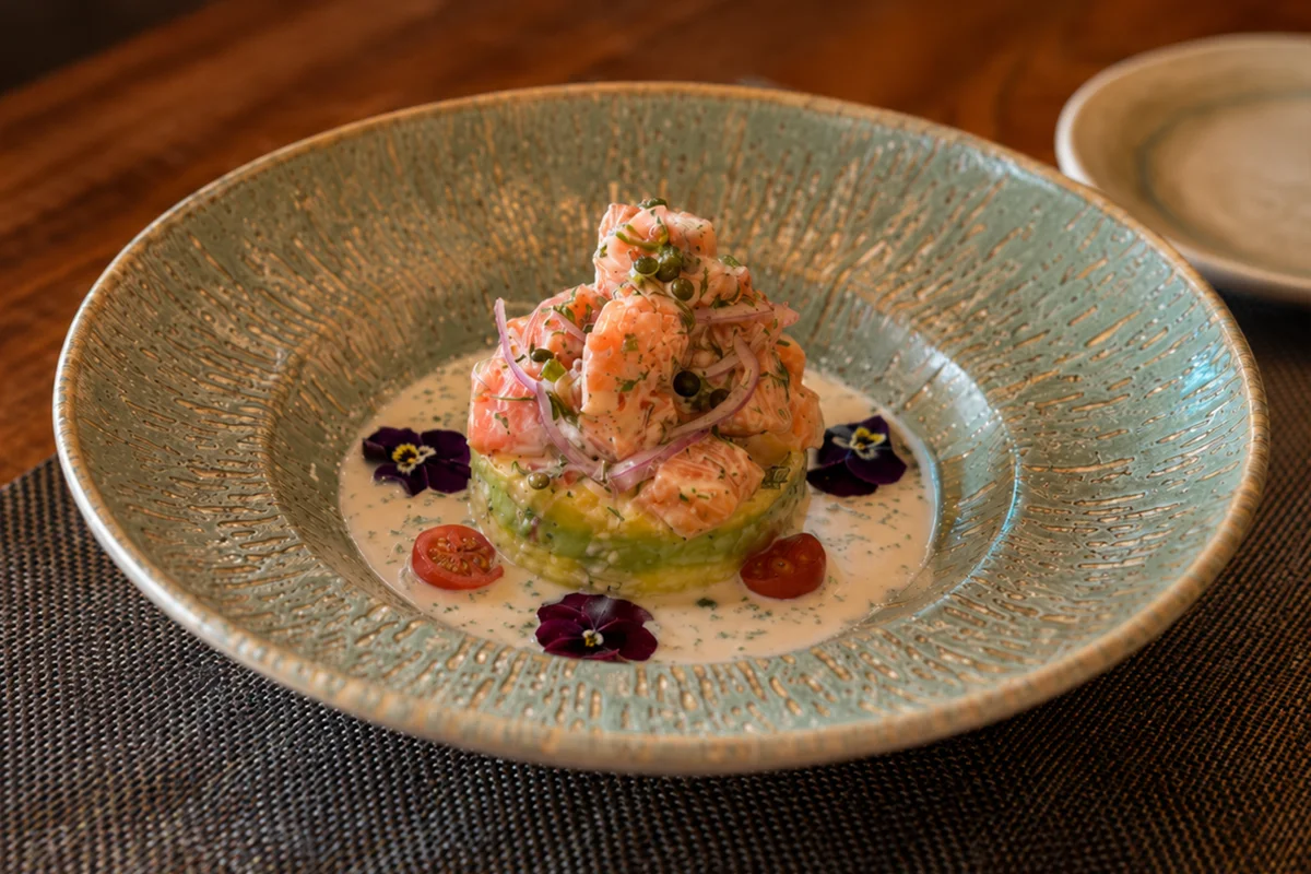 Ceviche con causa servido en el restaurante Don Pancho Taberna en Cusco Ceviche de pescado con causa limeña | TreXperience