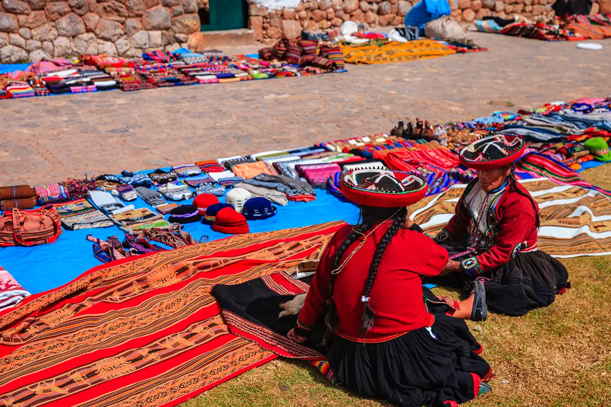 Women vendors at Chinchero Market | TreXperience Women vendors at Chinchero Market | TreXperience