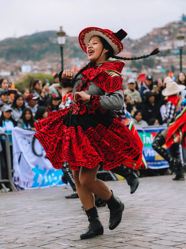 Female Cholo Qorilazo dancer in Cusco | TreXperience