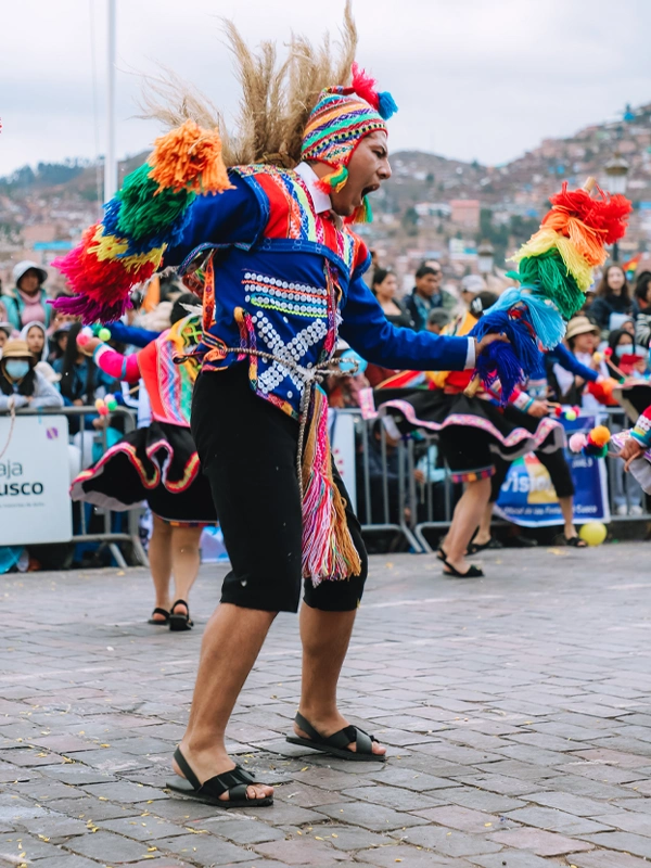 Male dancer during the folkloric parade in Cusco | TreXperience