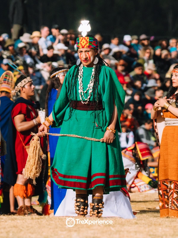 Woman dressed as an Amazonian ethnic representative at Inti Raymi in Cusco Woman dressed as an Amazonian ethnic representative at Inti Raymi in Cusco | TreXperience