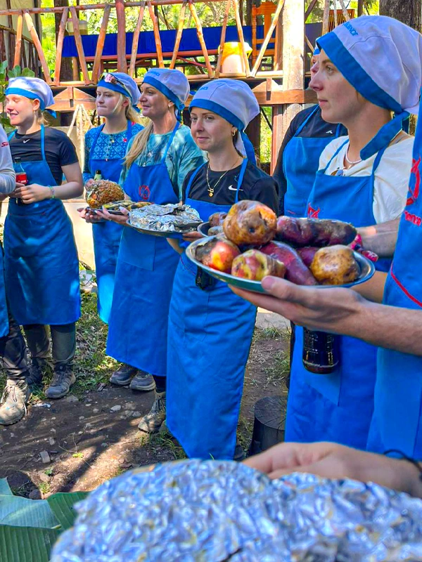 Pachamanca preparation Travelers preparing pachamanca | TreXperience