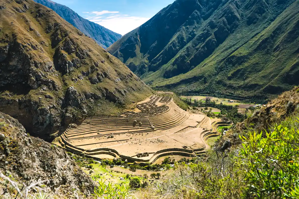 Llactapata site along the Inca Trail, surrounded by Andes mountain landscapes.