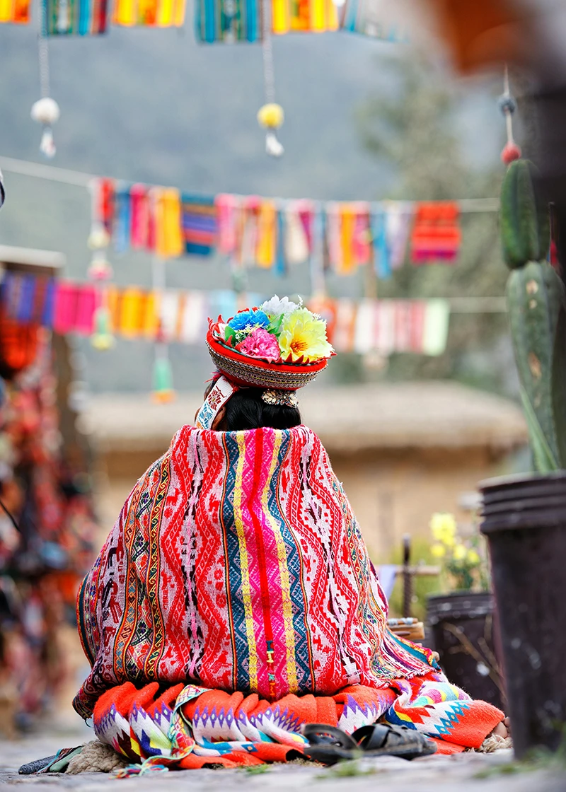 mujer usando ropa típica peruana | TreXperience