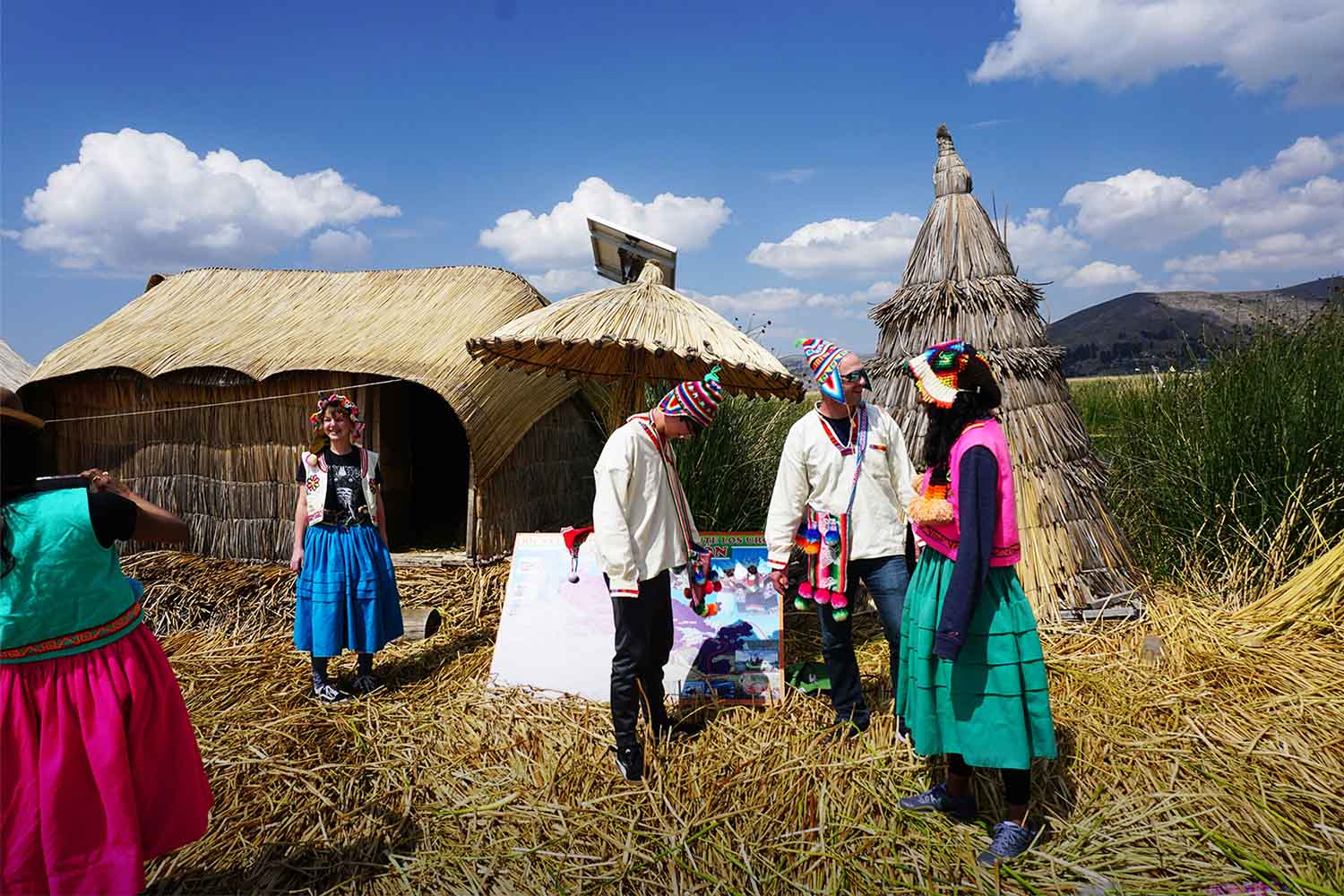 Group of persons in the Uros Islands | TreXperience