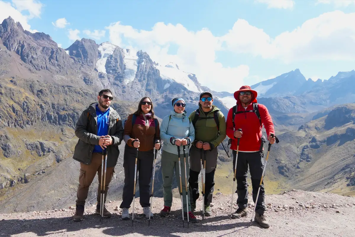 Trailhead to Rainbow Mountain: The Journey Begins Tourists at the trailhead, starting the hike to Rainbow Mountain.