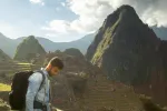 Tourist appreciating Machu Picchu | TreXperience