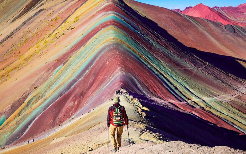 Hiker on Rainbow Mountain Peru | TreXperience