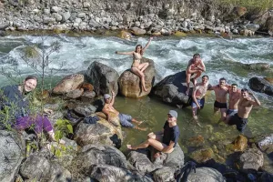 Taking a short break beside a river Salkantay Trek tours | Trexperience