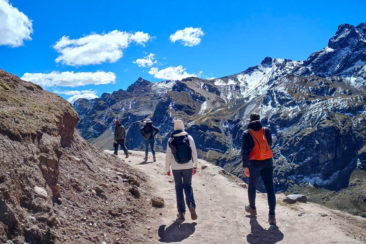 Tourists trekking to Vinicunca Rainbow Mountain | TreXperience