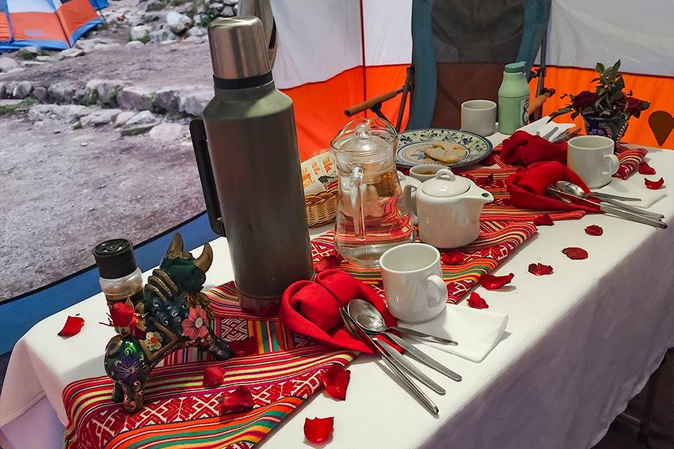 Breakfast table set at the Luxury Inca Trail camp with Andean textiles | TreXperience