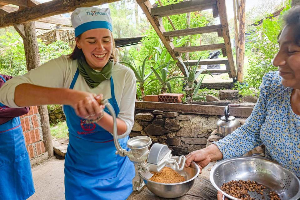 Grinding coffee during the Salkantay Trail 8 Days | TreXperience