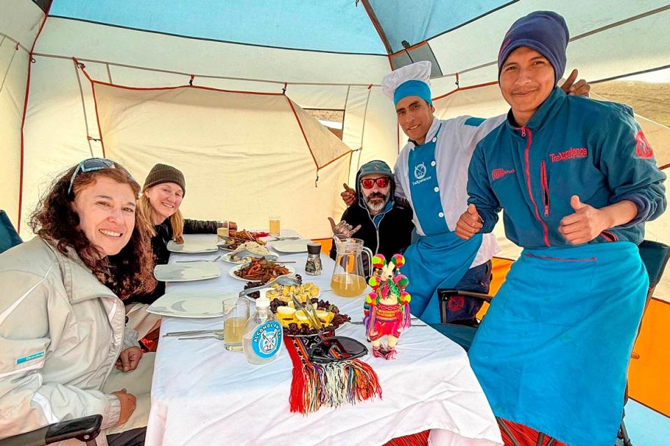 Chefs serving the luxury lunch in the premium Rainbow Mountain Peru tour | TreXperience