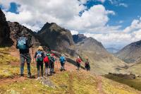 trekking between mountains in the lares trek | TreXperience
