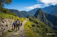 Inca Trail 5 day hike tourist arriving at machu picchu