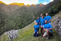 Luxury Short Inca Trail group posing at Wiñay Wayna | TreXperience