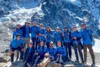 Hikers posing in front of snow-covered Salkantay Mountain | TreXperience