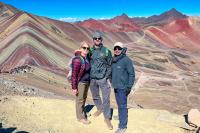 Tourists couple and guide during the premium Rainbow Mountain Peru tour | TreXperience