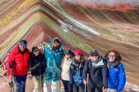 Group of tourists in front of Rainbow Mountain Vinicunca | TreXperience