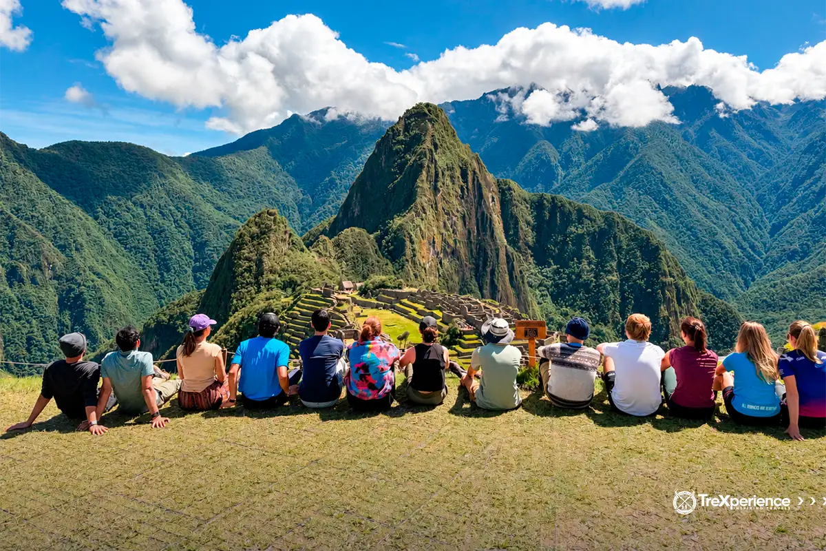 Learn how to get to Machu Picchu by the two routes Thirteen travelers gaze at Machu Picchu