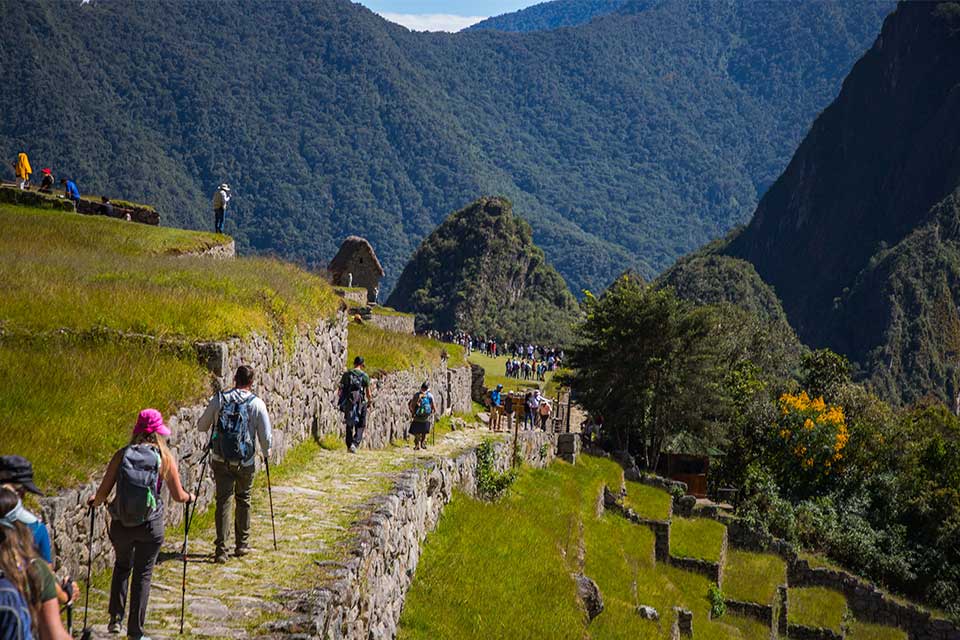 Tourist walking to Machu Picchu | TreXperience