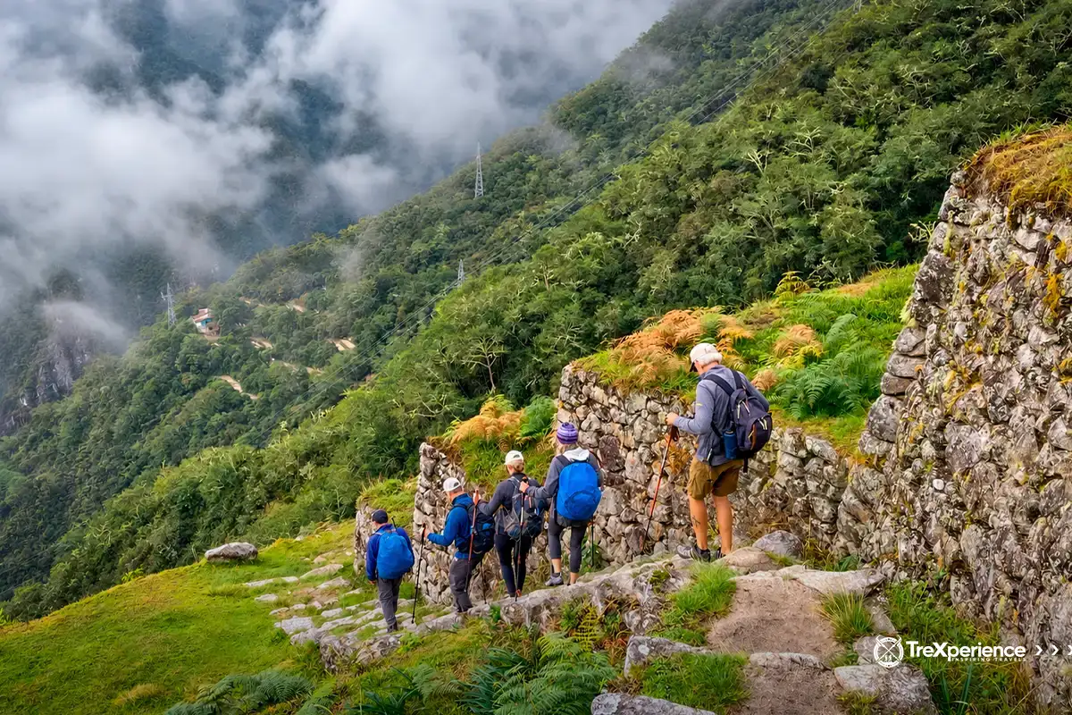 Trexperience travelers descending the steps of the Inca Trail Trexperience travelers descending the steps of the Inca Trail