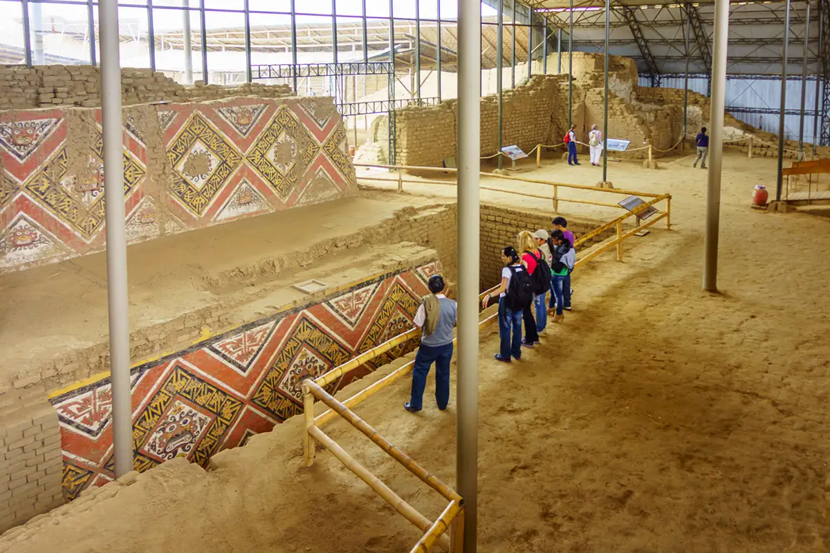 Visitors admiring the Huaca de la Luna